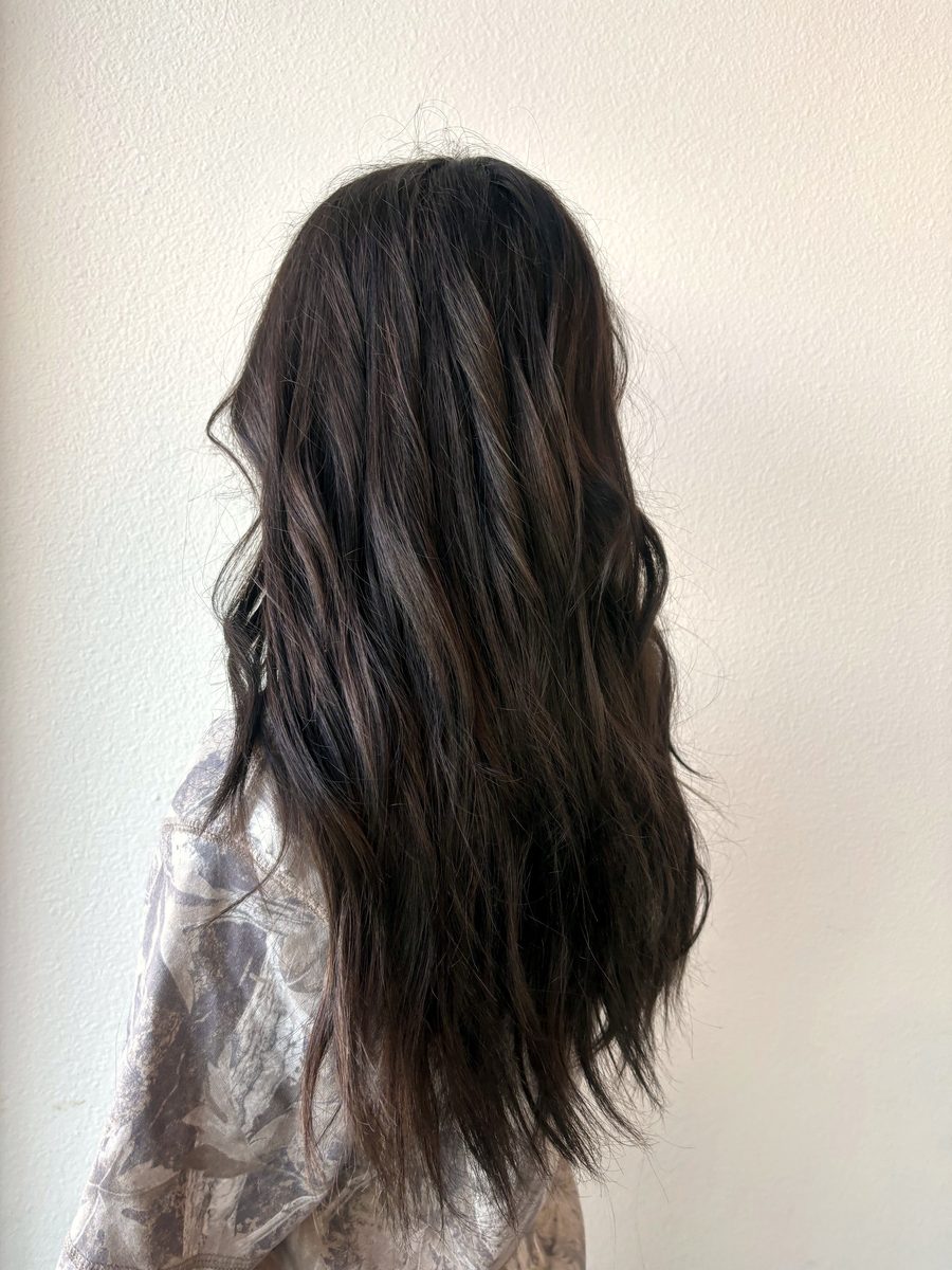 Dark brunette layered waves, back view by Leila Lee